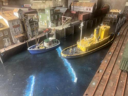 Bill Baker builds the H152 HO 48' Coastal Freighter and Bill says my new harbor addition to my Colorado midland silver creek division circa 1950s.