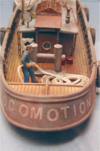 Bob-Schoepflin  Gets ready to tie up the tug at the dock