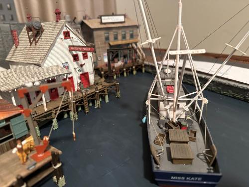 Shrimper with Barrett's Fish Market and The Ice House in the background