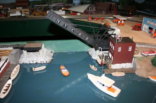 John-Reinhardt-HO-lobster-boat-at bascule-bridge-open. Kit number H128-4 HO lobster boat kit.