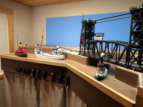 Michael Rineharts Harbor Lionel Bridge showing the HO-1125 White Swan and the HO H116 Tug kit